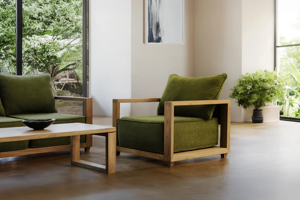 Completed reclaimed teak sofa and coffee table in a bright, modern living space.