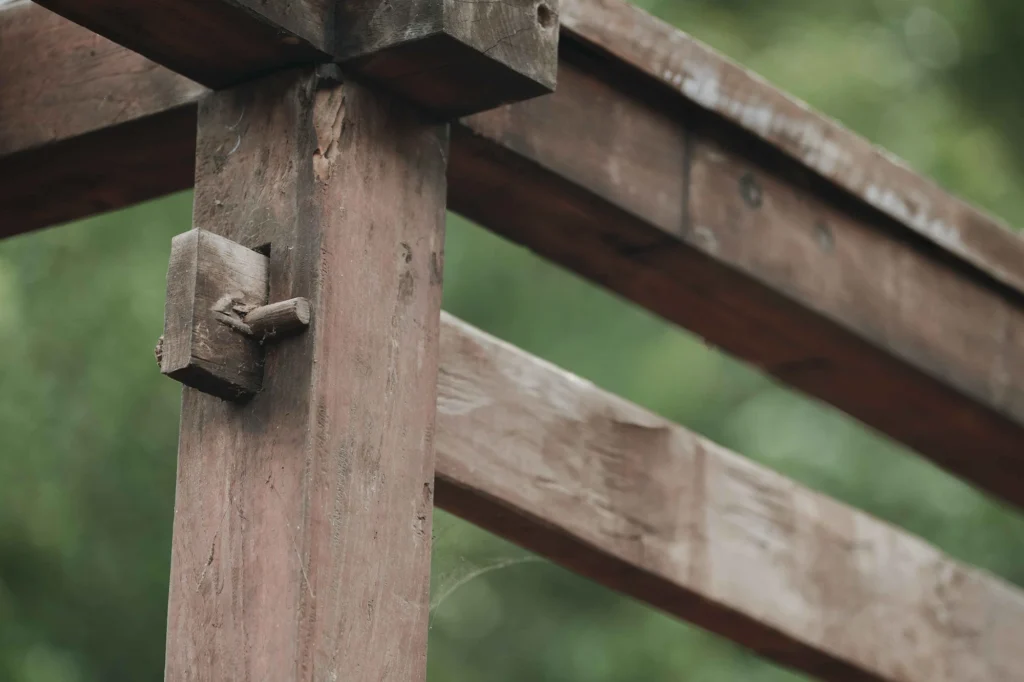 Detailed view of reclaimed teak showing natural texture (before going to the workshop)