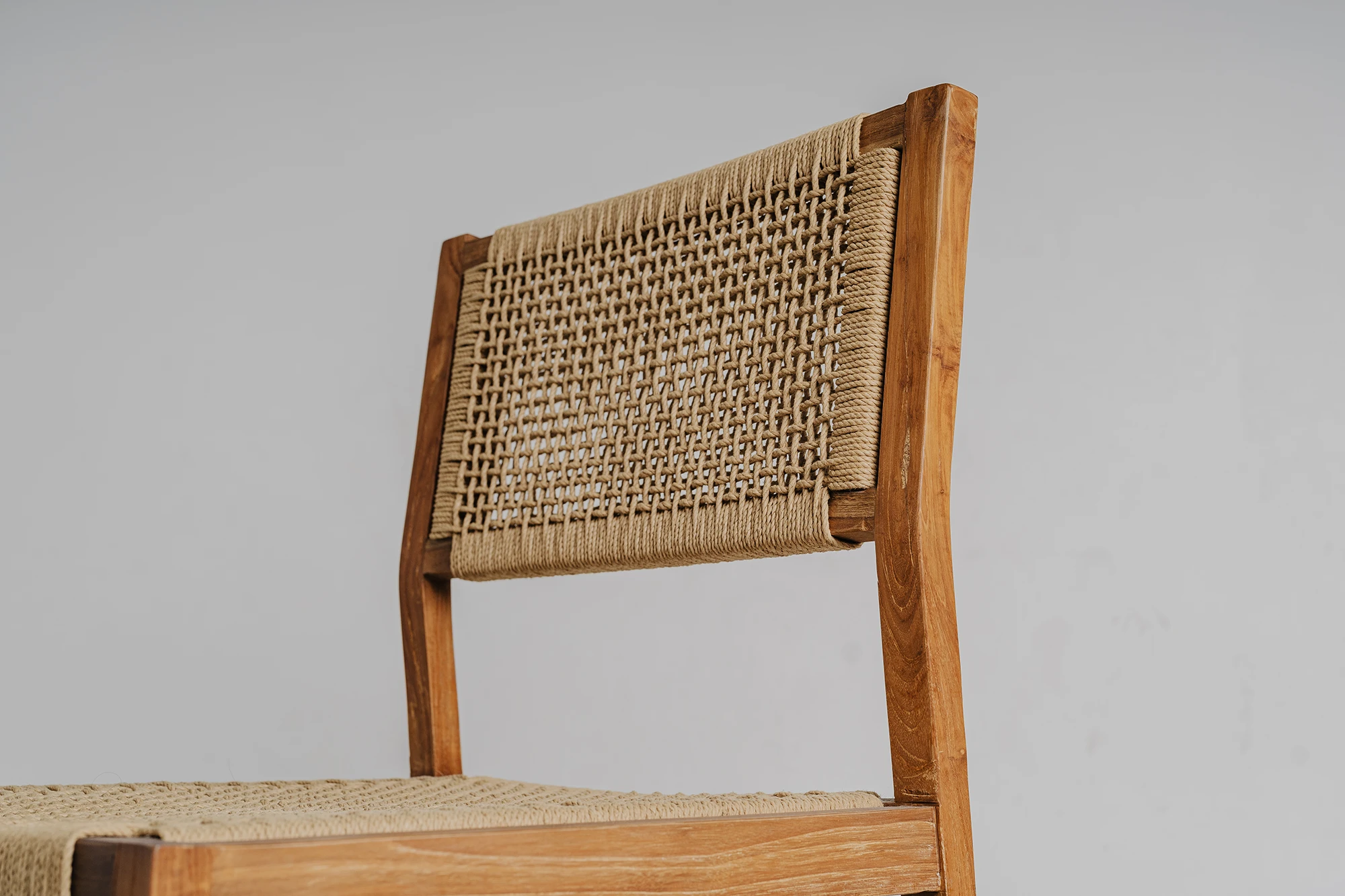 durable-reclaimed-teak-chair-with-natural-tones-and-paper-rope-accents-from-nusantara-lifestyle Durable reclaimed teak chair with natural tones and paper rope accents from Nusantara Lifestyle