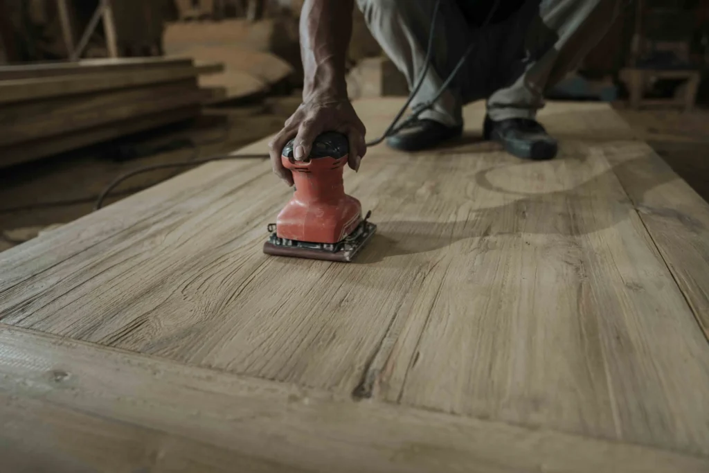 Modern tropical interior with reclaimed teak furniture from Nusantara Lifestyle featuring sustainable recycled fabric upholstery