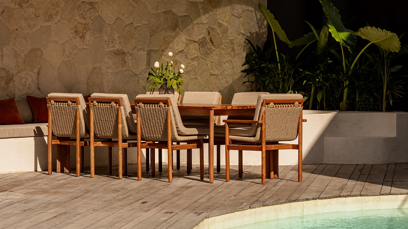 Reclaimed teak furniture in a contemporary Australian indoor-outdoor interior