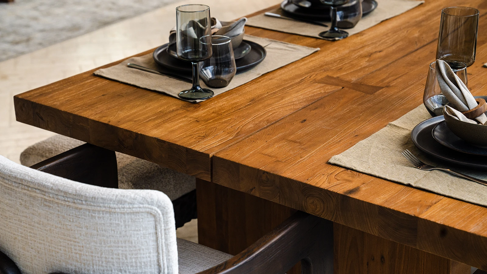 Close-up of reclaimed teak showing natural grain, patina and fixing marks
